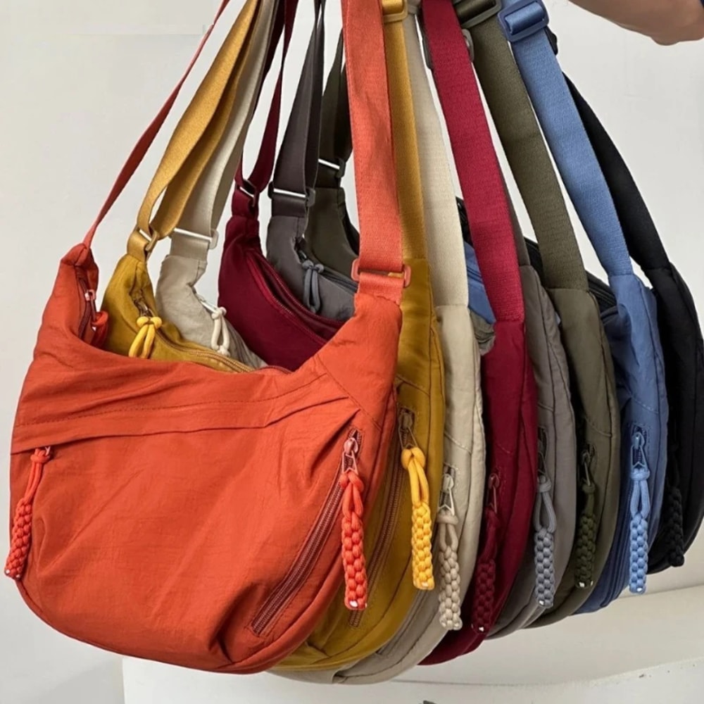 CompactCarry Pro™ Borsa a tracolla minimalista in nylon