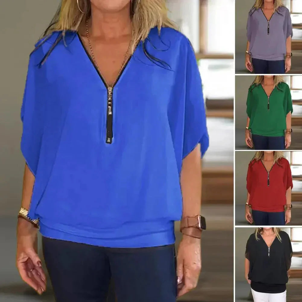 Kaylee™ Top casual con mezza zip