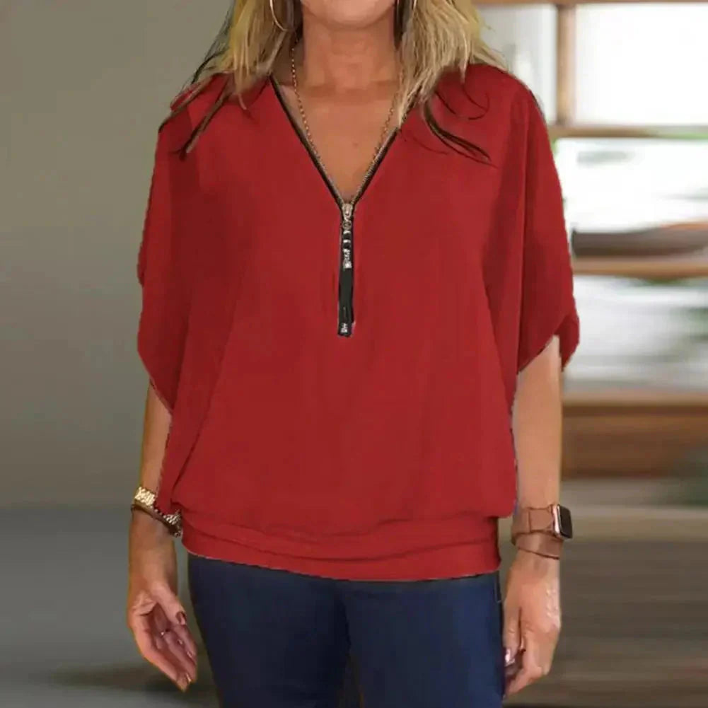 Kaylee™ Top casual con mezza zip