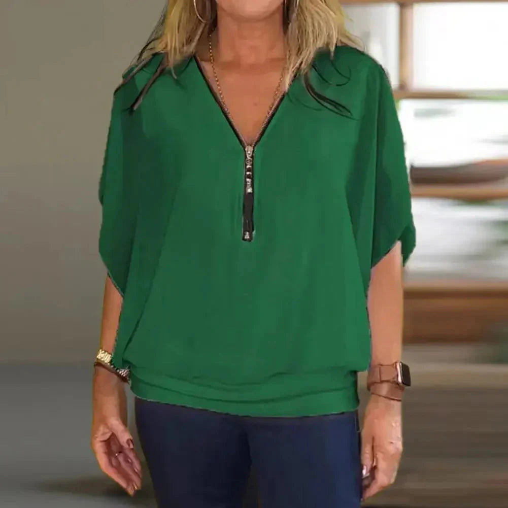 Kaylee™ Top casual con mezza zip