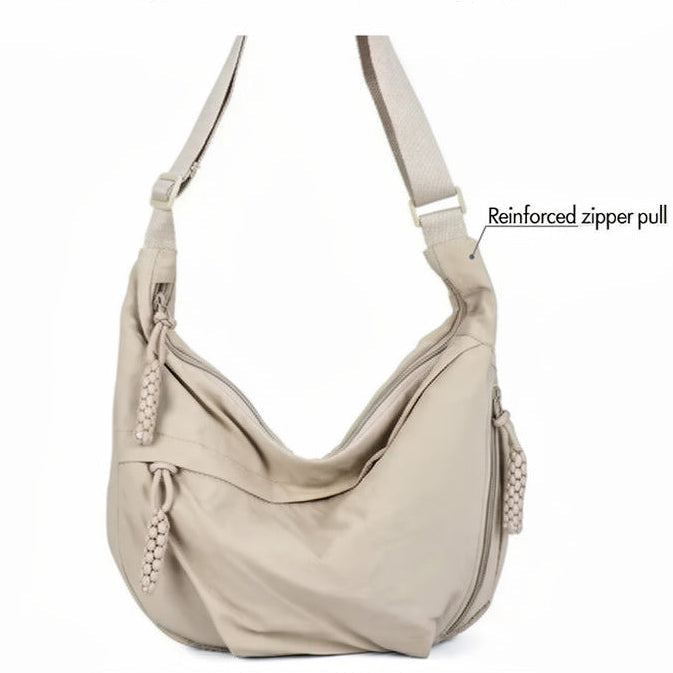 CompactCarry Pro™ Borsa a tracolla minimalista in nylon