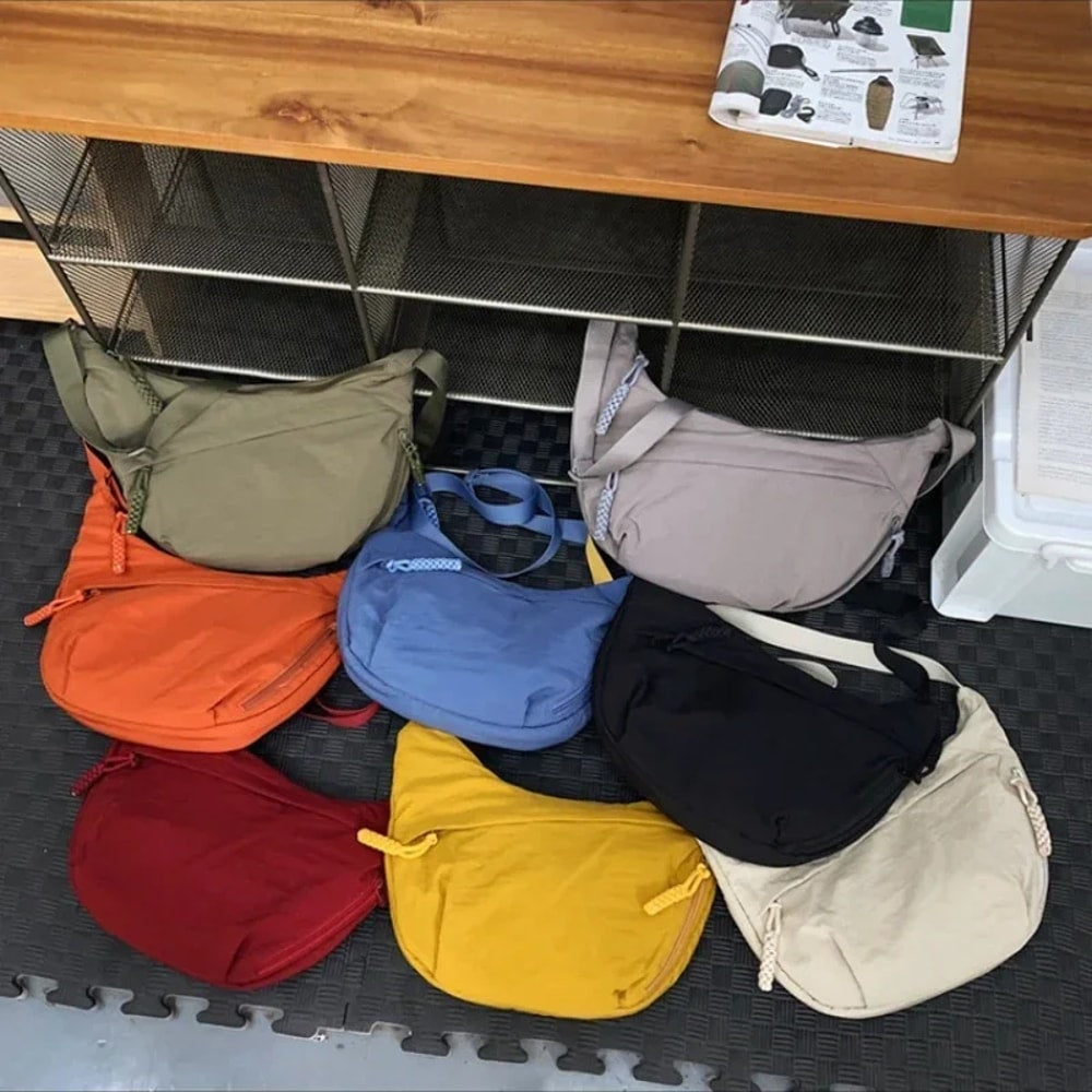 CompactCarry Pro™ Borsa a tracolla minimalista in nylon