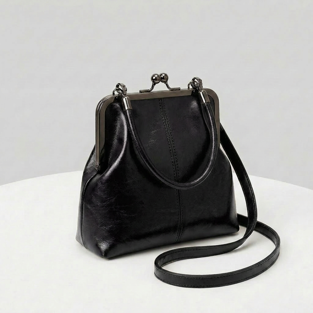 RetroSling™ Borsa a tracolla vintage compatta