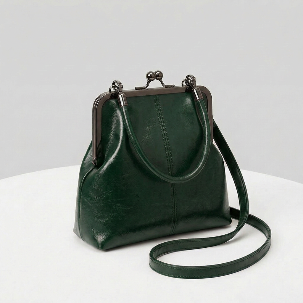 RetroSling™ Borsa a tracolla vintage compatta